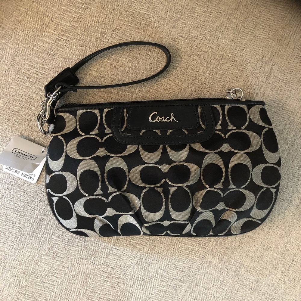 NEW Coach wristlet with tags